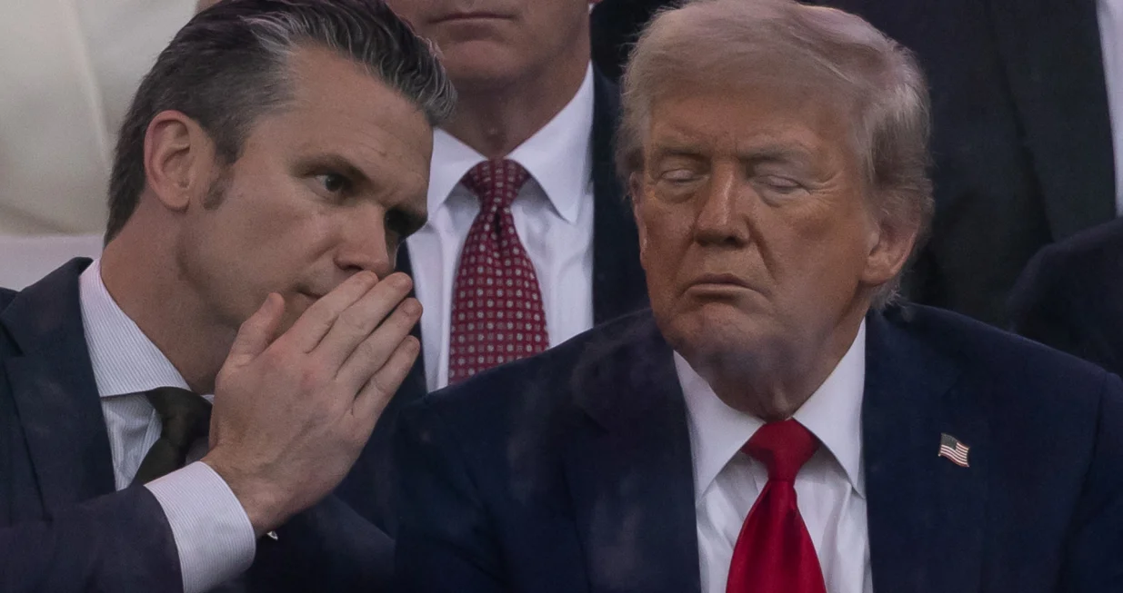 U.S. Secretary of Defense Pete Hegseth and U.S. President Donald Trump attend the U.S. Army's 250th Birthday parade, on the same day of U.S. President Donald Trump 79th birthday, in Washington, D.C., U.S., June 14, 2025. REUTERS/Carlos Barria/Carlos Barria