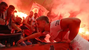 Soccer Football - DFB Cup - Final - Arminia Bielefeld v VFB Stuttgart - Olympiastadion, Berlin, Germany - May 24, 2025 VfB Stuttgart's Ermedin Demirovic celebrates with fans after winning the DFB Cup Final REUTERS/Leon Kuegeler DFB REGULATIONS PROHIBIT ANY USE OF PHOTOGRAPHS AS IMAGE SEQUENCES AND/OR QUASI-VIDEO.