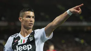 epa09432490 (FILE) -Juventus' Cristiano Ronaldo reacts during the UEFA Champions League Group H soccer match between Manchester United and Juventus FC held at Old Trafford in Manchester, Britain, 23 September 2018 (reissued on 27 August 2021). Manchester United confirms Ronaldo's transfer from Juventus on 27 August 2021. EPA/PETER POWELL *** Local Caption *** 54722347
