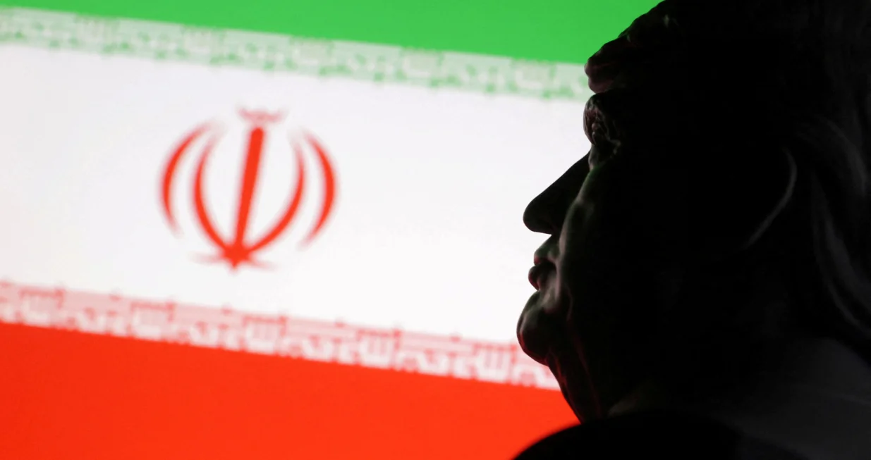 A 3D printed miniature model of U.S. President Donald Trump and Iran flag are seen in this illustration taken June 18, 2025. REUTERS/Dado Ruvic/Illustration/Dado Ruvic