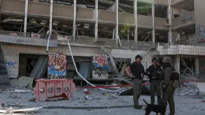 Emergency personnel work at an impact site following Iran's missile strike on Israel, amid the Iran-Israel conflict, in Haifa, Israel, June 20, 2025. REUTERS/Florion Goga/Florion Goga