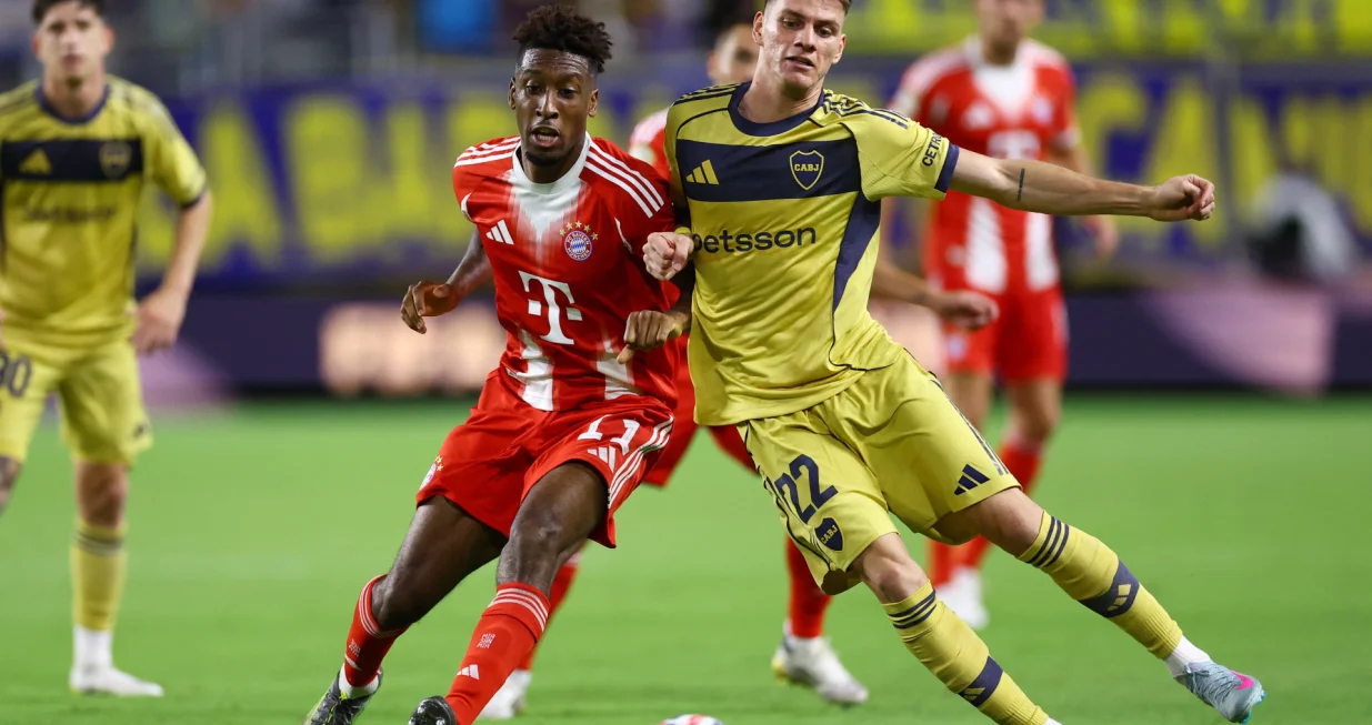 Soccer Football - FIFA Club World Cup - Group C - Bayern Munich v Boca Juniors - Hard Rock Stadium, Miami Gardens, Florida, U.S. - June 20, 2025 Bayern Munich's Kingsley Coman in action with Boca Juniors' Kevin Zenon REUTERS/Hannah Mckay