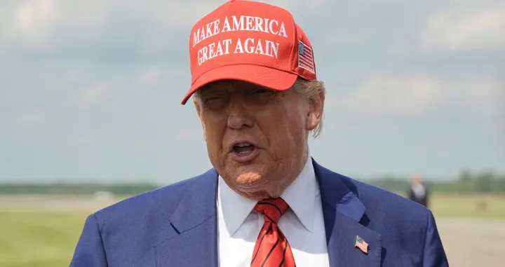 FILE PHOTO: U.S. President Donald Trump talks to reporters upon his arrival at Morristown Municipal Airport in Morristown, New Jersey, U.S., June 20, 2025. REUTERS/Ken Cedeno/File Photo/Ken Cedeno