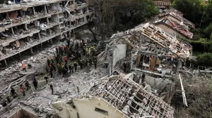 First responders gather at an impact site following Iran's strike on Israel, amid the Iran-Israel conflict, in Haifa, Israel, June 22, 2025. REUTERS/Florion Goga/Florion Goga