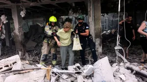 First responders gather at an impact site following Iran's strike on Israel, amid the Iran-Israel conflict, in Haifa, Israel, June 22, 2025. REUTERS/Florion Goga/Florion Goga