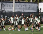 Soccer Football - Club World Cup - Real Madrid Training - Gardens North Country District Park, Palm Beach Gardens, Florida, U.S. - June 15, 2025 Real Madrid's Rodrygo, Thibaut Courtois and Eder Militao with teammates during training REUTERS/Hannah Mckay