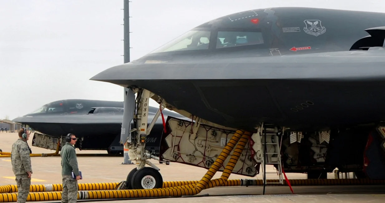 FILE PHOTO: Maintainers and crew chiefs from the 509th Aircraft Maintenance Squadron prepare B-2 Spirits at Whiteman Air Force Base in this U.S. Air Force handout photo dated March 19, 2011. The stealth bombers are supporting "Operation Odyssey Dawn" over Libya. Picture taken March 19, 2011. REUTERS/U.S. Air Force/Senior Airman Kenny Holston/Handout (UNITED STATES - Tags: MILITARY CONFLICT POLITICS) FOR EDITORIAL USE ONLY. NOT FOR SALE FOR MARKETING OR ADVERTISING CAMPAIGNS. THIS IMAGE HAS BEEN SUPPLIED BY A THIRD PARTY. IT IS DISTRIBUTED, EXACTLY AS RECEIVED BY REUTERS, AS A SERVICE TO CLIENTS/File Photo/Ho New