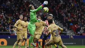 epa10396313 FC Barcelona's goalkeeper Marc-Andre Ter Stegen (C) in action during the Spanish LaLiga soccer match between Atletico de Madrid and FC Barcelona at Civitas Metropolitano stadium in Madrid, Spain, 08 January 2023. EPA/J.J.Guillen