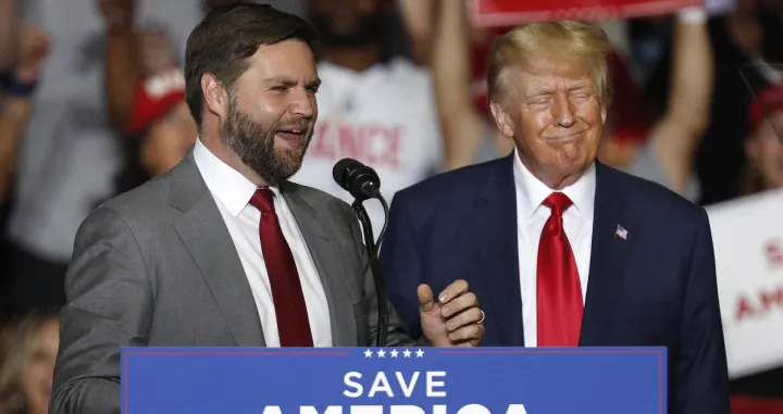 epa10190799 J.D. Vance (L), Republican Nominee for US Senator for Ohio, appears on stage at a Save America rally with former US President Donald Trump (R) at the Covelli Centre in Youngstown, Ohio, USA, 17 September 2022. EPA/DAVID MAXWELL/David Maxwell
