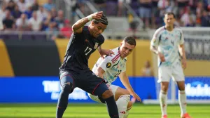Jun 29, 2025; Minneapolis, Minnesota, USA; United States of America forward Malik Tillman (17) and Costa Rica midfielder Carlos Mora (22) battle for the ball in the first half during a quarterfinal match of the 2025 Gold Cup at U.S. Bank Stadium. Mandatory Credit: Brad Rempel-Imagn Images