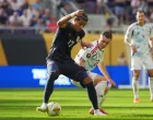 Jun 29, 2025; Minneapolis, Minnesota, USA; United States of America forward Malik Tillman (17) and Costa Rica midfielder Carlos Mora (22) battle for the ball in the first half during a quarterfinal match of the 2025 Gold Cup at U.S. Bank Stadium. Mandatory Credit: Brad Rempel-Imagn Images