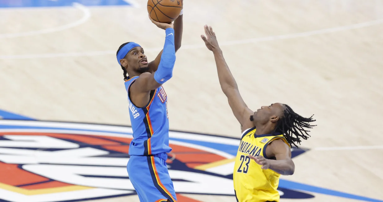 Jun 22, 2025; Oklahoma City, Oklahoma, USA; Oklahoma City Thunder guard Shai Gilgeous-Alexander (2) shoots the ball againstIndiana Pacers forward Aaron Nesmith (23) during the first half of game seven of the 2025 NBA Finals at Paycom Center. Mandatory Credit: Alonzo Adams-Imagn Images