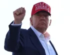 U.S. President Donald Trump wears a "Gulf of America" hat as he boards Air Force One to depart for Florida, at Joint Base Andrews, Maryland, U.S., July 1, 2025. REUTERS/Evelyn Hockstein  TPX IMAGES OF THE DAY/Evelyn Hockstein