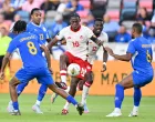 Jun 21, 2025; Houston, Texas, USA; Canada forward Jonathan David (10) controls the ball against Curacao in the second half during a group stage match of the 2025 Gold Cup at Shell Energy Stadium. Mandatory Credit: Maria Lysaker-Imagn Images
