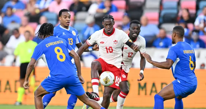 Jun 21, 2025; Houston, Texas, USA; Canada forward Jonathan David (10) controls the ball against Curacao in the second half during a group stage match of the 2025 Gold Cup at Shell Energy Stadium. Mandatory Credit: Maria Lysaker-Imagn Images