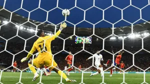 Soccer Football - Nations League - Semi Final - Spain v France - MHPArena, Stuttgart, Germany - June 5, 2025 Spain's Nico Williams scores their first goal past France's Mike Maignan REUTERS/Annegret Hilse