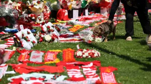 Flowers and tributes are left outside Liverpool's Anfield Stadium after Liverpool's Portuguese soccer player Diogo Jota died in a car crash near Zamora, Spain, in Liverpool, Britain, July 3, 2025. REUTERS/Temilade Adelaja