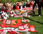 Flowers and tributes are left outside Liverpool's Anfield Stadium after Liverpool's Portuguese soccer player Diogo Jota died in a car crash near Zamora, Spain, in Liverpool, Britain, July 3, 2025. REUTERS/Temilade Adelaja