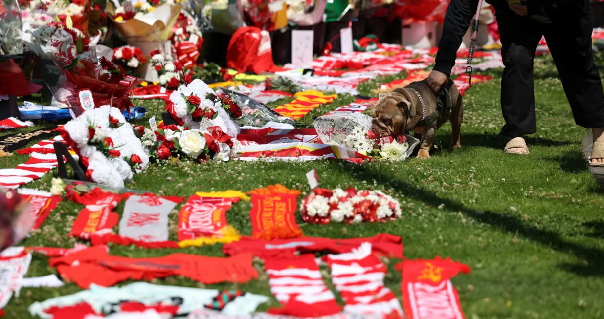 Flowers and tributes are left outside Liverpool's Anfield Stadium after Liverpool's Portuguese soccer player Diogo Jota died in a car crash near Zamora, Spain, in Liverpool, Britain, July 3, 2025. REUTERS/Temilade Adelaja