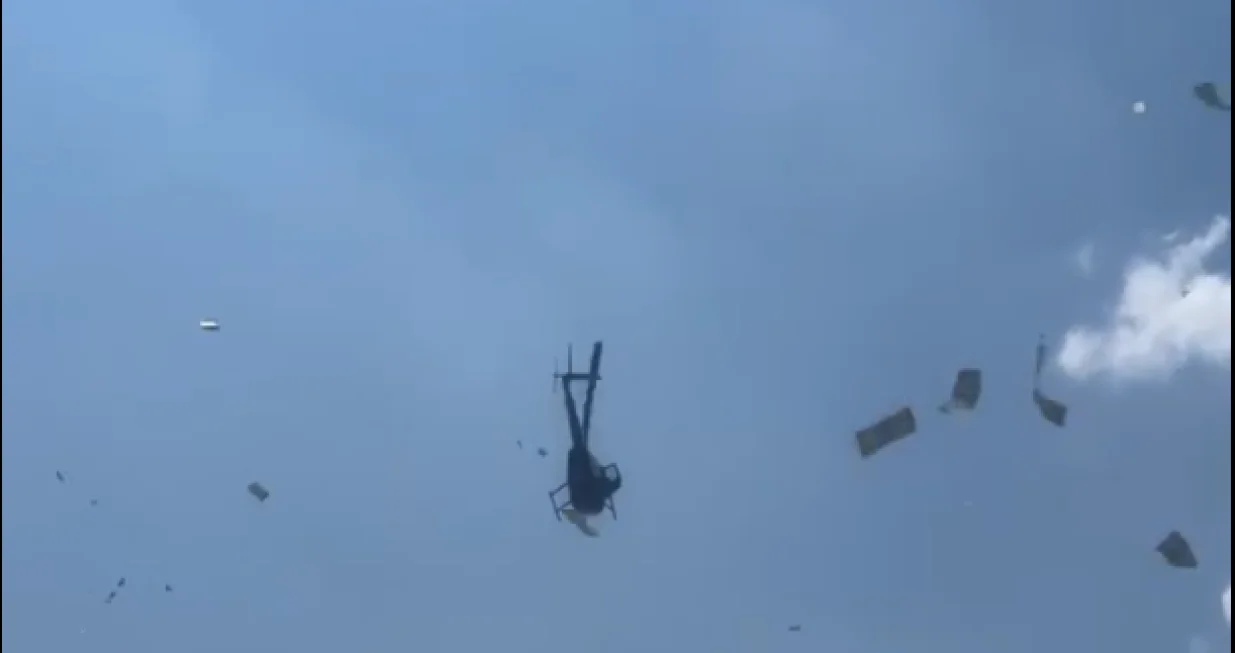 novac iz helikptera/Screenshot X
