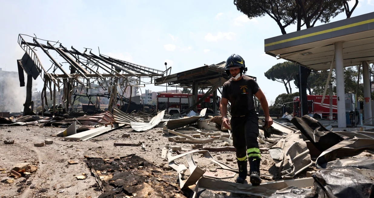 A firefighter works at the scene where a gas station exploded on the outskirts of Rome, Italy, July 4, 2025. REUTERS/Matteo Minnella  TPX IMAGES OF THE DAY/Matteo Minnella