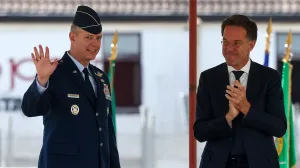NATO Secretary General Mark Rutte applauds as U.S. Air Force General Alexus Grynkewich waves during a ceremony where Grynkewich takes over as NATO's new Supreme Allied Commander Europe (SACEUR), at the Supreme Headquarters Allied Powers Europe (SHAPE), in Casteau, Belgium July 4, 2025. REUTERS/Yves Herman/Yves Herman