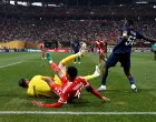 Soccer Football - FIFA Club World Cup - Quarter Final - Paris St Germain v Bayern Munich - Mercedes-Benz Stadium, Atlanta, Georgia, U.S. - July 5, 2025 Bayern Munich's Jamal Musiala sustains an injury after a collision with Paris St Germain's Gianluigi Donnarumma REUTERS/Pablo Morano