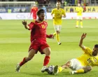 epa10013353 Marius Marin (R) of Romania in action against Ilija Vukotic (L) of Montenegro during the UEFA Nations League soccer match between Romania and Montenegro in Bucharest, Romania, 14 June 2022. EPA/ROBERT GHEMENT