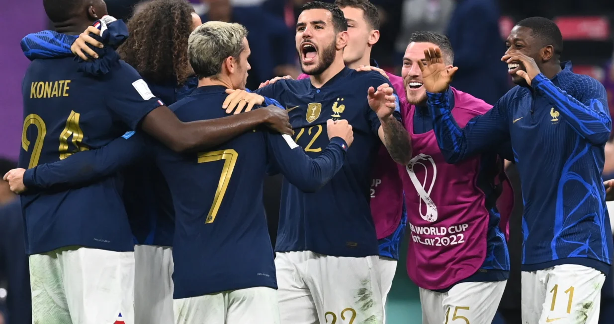 epa10366348 Theo Hernandez (C) of France and teammates celebrate after winning the FIFA World Cup 2022 semi final between France and Morocco at Al Bayt Stadium in Al Khor, Qatar, 14 December 2022. EPA/Georgi Licovski