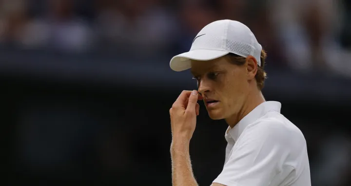 Tennis - Wimbledon - All England Lawn Tennis and Croquet Club, London, Britain - July 7, 2025 Italy's Jannik Sinner reacts during his round of 16 match against Bulgaria's Grigor Dimitrov REUTERS/Andrew Couldridge