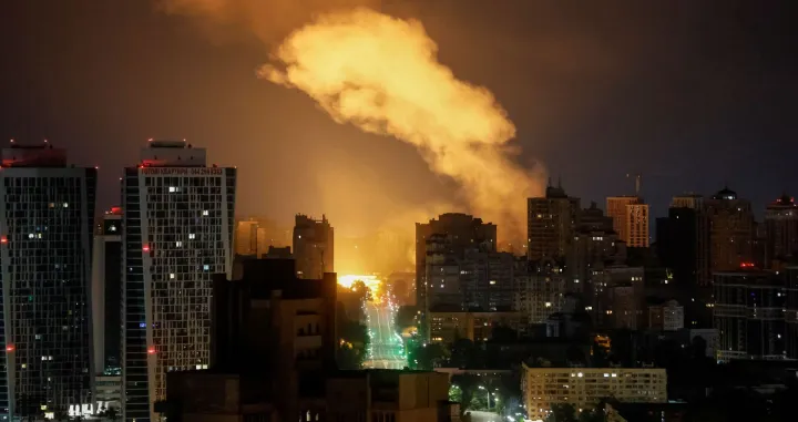 An explosion of a drone lights up the sky over the city during a Russian drone and missile strike, amid Russia's attack on Ukraine, in Kyiv, Ukraine July 10, 2025. REUTERS/Gleb Garanich/Gleb Garanich