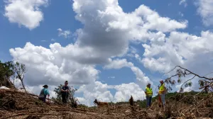 People take part in the search and rescue operation looking for missing people by the Guadalupe River, in Hunt, Texas, U.S. July 9, 2025. REUTERS/Umit Bektas/Umit Bektas