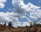 People take part in the search and rescue operation looking for missing people by the Guadalupe River, in Hunt, Texas, U.S. July 9, 2025. REUTERS/Umit Bektas/Umit Bektas