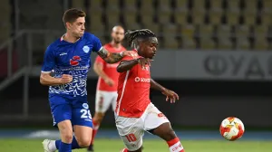 epa09358717 Lincoln (R) of Santa Clara in action against Konstantin Cheshmedjiev (L) of Shkupi during the UEFA Conference League second qualifying round, first leg soccer match between FC Shkupi and CD Santa Clara in Skopje, Republic of North Macedonia, 22 July 2021. EPA/GEORGI LICOVSKI