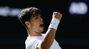 Tennis - Wimbledon - All England Lawn Tennis and Croquet Club, London, Britain - June 30, 2025 Spain's Carlos Alcaraz reacts during his first round match against Italy's Fabio Fognini REUTERS/Stephanie Lecocq  TPX IMAGES OF THE DAY