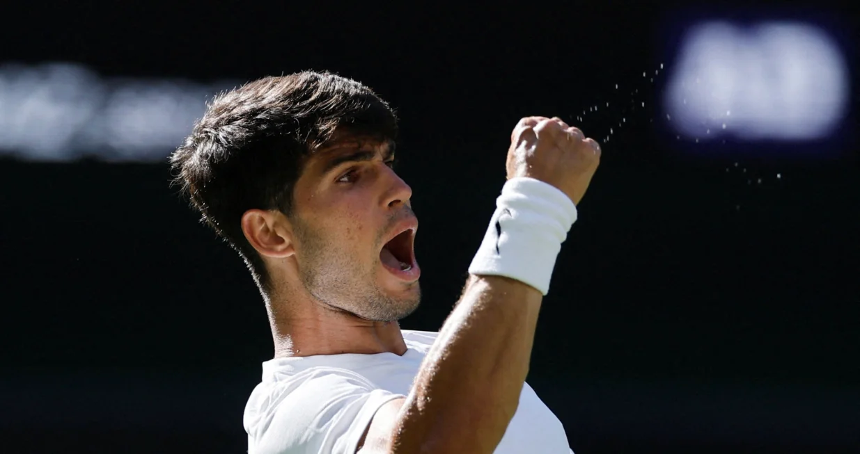 Tennis - Wimbledon - All England Lawn Tennis and Croquet Club, London, Britain - June 30, 2025 Spain's Carlos Alcaraz reacts during his first round match against Italy's Fabio Fognini REUTERS/Stephanie Lecocq  TPX IMAGES OF THE DAY