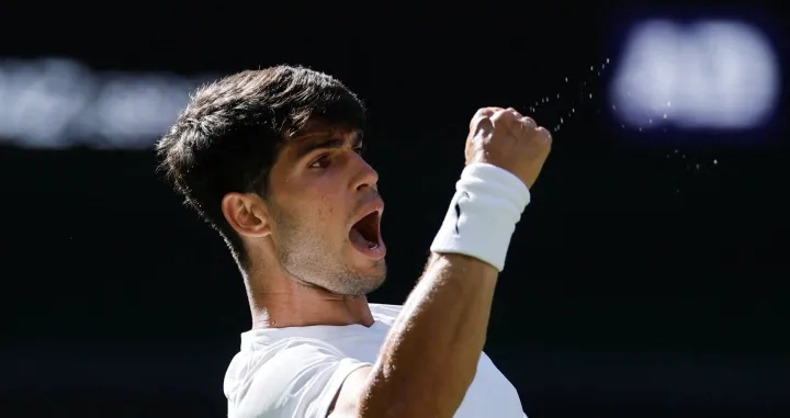 Tennis - Wimbledon - All England Lawn Tennis and Croquet Club, London, Britain - June 30, 2025 Spain's Carlos Alcaraz reacts during his first round match against Italy's Fabio Fognini REUTERS/Stephanie Lecocq  TPX IMAGES OF THE DAY
