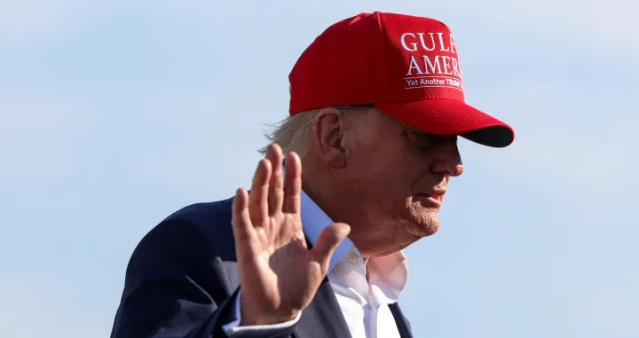 U.S. President Donald Trump wears a "Gulf of America" hat as he departs en route to Florida, at Joint Base Andrews, Maryland, U.S., July 1, 2025. REUTERS/Evelyn Hockstein/Evelyn Hockstein