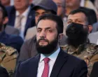 FILE PHOTO: Syria's interim President Ahmed al-Sharaa looks on as he attends the "Aleppo, Key to Victory" celebration marking Syria's liberation, in Aleppo, Syria May 27, 2025. REUTERS/Khalil Ashawi/File Photo/Khalil Ashawi