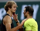 epa09994218 Alexander Zverev of Germany (L) reacts with Rafael Nadal of Spain after retiring due to an injury in the men's semi-final match during the French Open tennis tournament at Roland ​Garros in Paris, France, 03 June 2022. EPA/YOAN VALAT