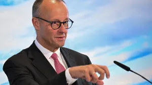 German Chancellor Friedrich Merz attends a press conference following a Bavarian state cabinet meeting on Germany's highest mountain, the Zugspitze, near Garmisch-Partenkirchen, Germany, July 15, 2025. REUTERS/Angelika Warmuth/Angelika Warmuth