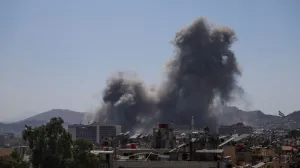 Smoke rises after Israeli strikes on Syria's defense ministry in Damascus, according to Al Jazeera TV, in Damascus, Syria July 16, 2025. REUTERS/Khalil Ashawi/Khalil Ashawi
