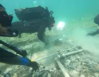 Archaeologists dive in the lake of Ohrid to uncover objects, in the village of Lin, Albania, July 11, 2025. LIN3/Kristi Anastasi/Handout via REUTERS THIS IMAGE HAS BEEN SUPPLIED BY A THIRD PARTY/Lin3/kristi Anastasi