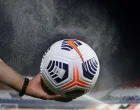 epa09125680 A man disinfects a ball to avoid the spread of coronavirus prior the Copa Libertadores soccer match between Independiente del Valle (IDV) and Gremio Defensores del Chaco stadium in Asuncion, Paraguay, 09 April 2021. EPA/NATHALIA AGUILAR/POOL