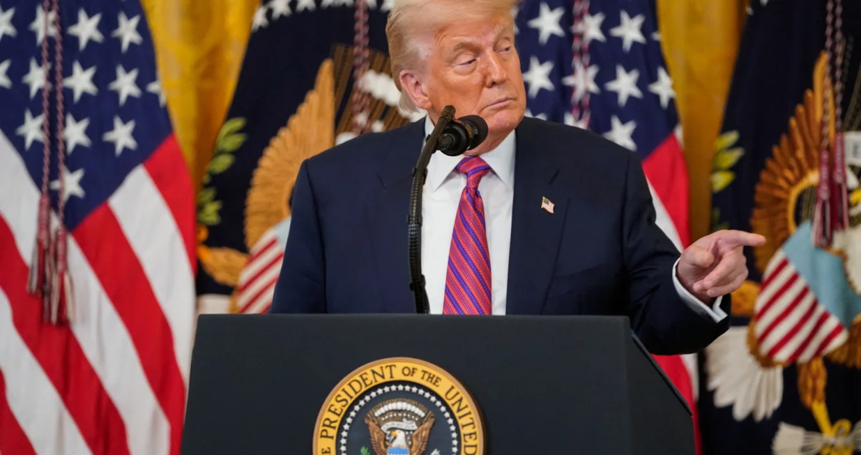 U.S. President Donald Trump speaks before signing the "Genius Act", which will develop regulatory framework for stablecoin cryptocurrencies and expand oversight of the industry, at the White House in Washington, D.C., U.S., July 18, 2025. REUTERS/Nathan Howard/Nathan Howard