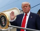 U.S. President Donald Trump waves as he disembarks from Air Force One at Glasgow Prestwick Airport, in Prestwick, Scotland, Britain, July 25, 2025. REUTERS/Evelyn Hockstein/Evelyn Hockstein