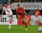 epa10004539 Georgia's Khvicha Kvaratskhelia (L) in action against North Macedonia's Darko Velkovski (R) during the UEFA Nations League soccer match between North Macedonia and Georgia in Skopje, Republic of North Macedonia, 09 June 2022. EPA/Georgi Licovski