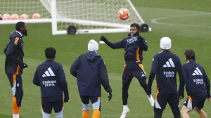 Soccer Football - LaLiga - Real Madrid Training - Ciudad Real Madrid, Valdebebas, Madrid, Spain - April 4, 2025 Real Madrid's Rodrygo and Antonio Rudiger during training REUTERS/Juan Medina