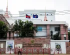 A woman walks past the Royal Embassy of Cambodia, after Thailand recalled its ambassador to Cambodia and said it would expel Cambodia's ambassador, following a landmine incident that injured Thai soldiers and recent clashes along the disputed border between the two countries, in Bangkok, Thailand, July 24, 2025. REUTERS/Chalinee Thirasupa/Chalinee Thirasupa