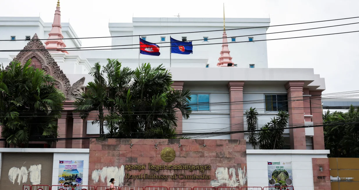 A woman walks past the Royal Embassy of Cambodia, after Thailand recalled its ambassador to Cambodia and said it would expel Cambodia's ambassador, following a landmine incident that injured Thai soldiers and recent clashes along the disputed border between the two countries, in Bangkok, Thailand, July 24, 2025. REUTERS/Chalinee Thirasupa/Chalinee Thirasupa